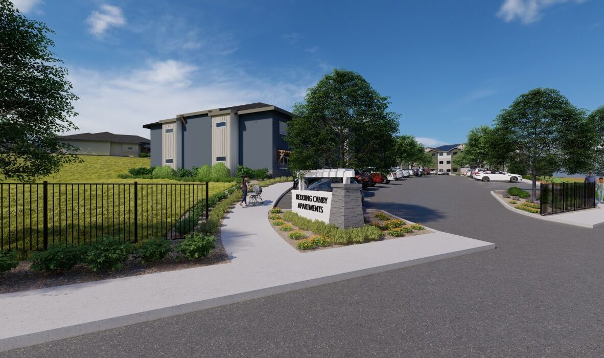 A gated entrance leads into a residential complex named Retreat East Apartments. The scene includes well-manicured landscaping, a clear blue sky, and parked cars. The complex consists of modern, multi-story buildings.